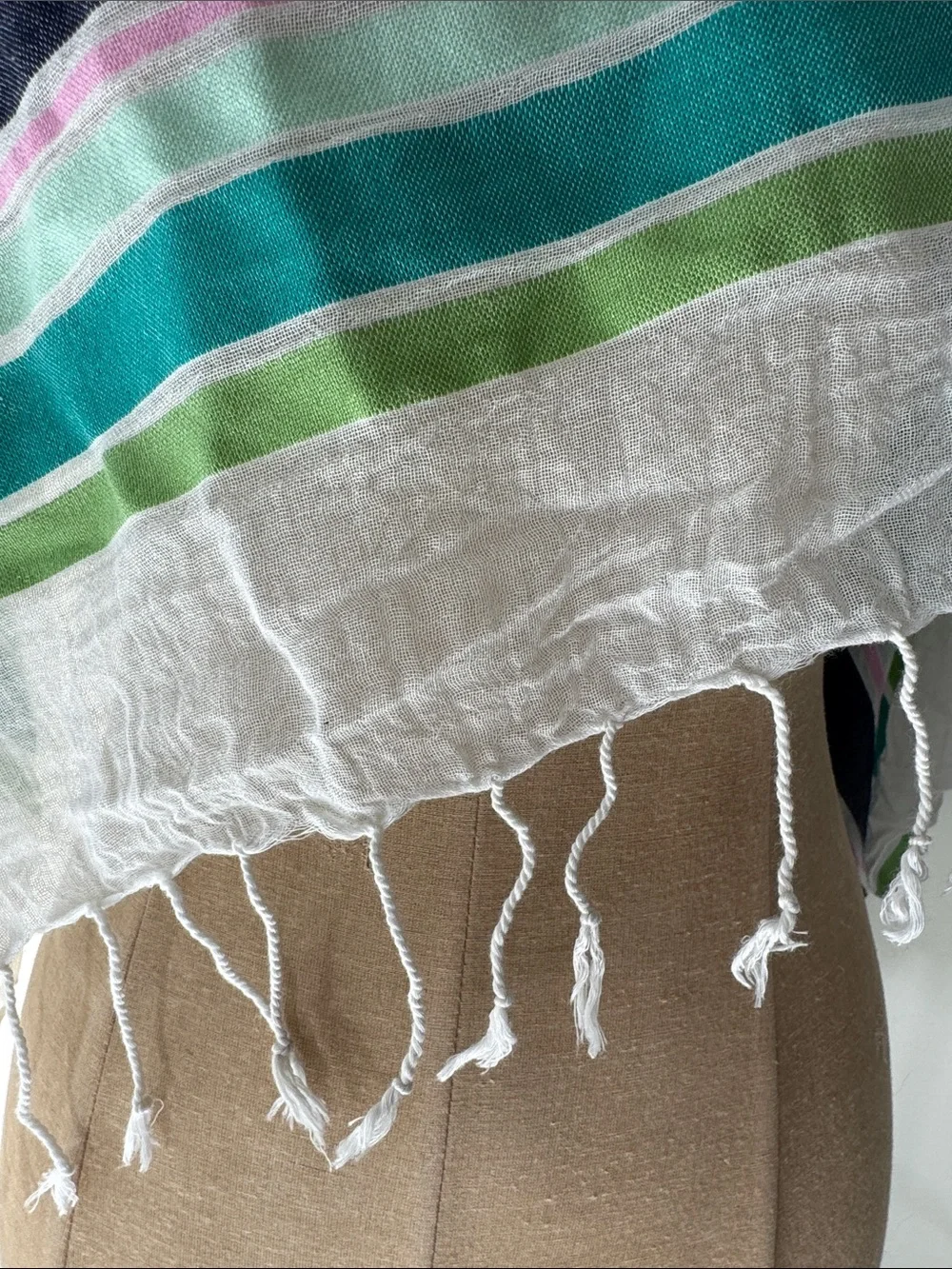 Old Navy white, navy, green and pink tasseled wrap.